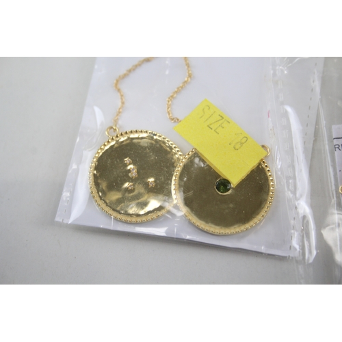 324 - A collection of gold tone silver zodiac necklaces (94g)