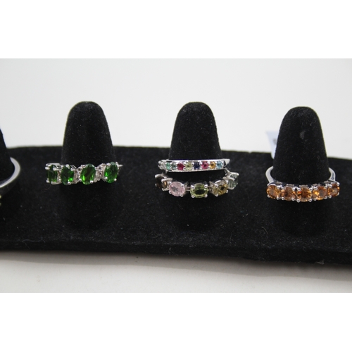 326 - A collection of silver gemstone rings including Ruby (27g)