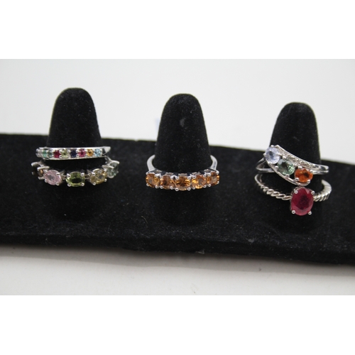 326 - A collection of silver gemstone rings including Ruby (27g)