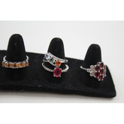 326 - A collection of silver gemstone rings including Ruby (27g)