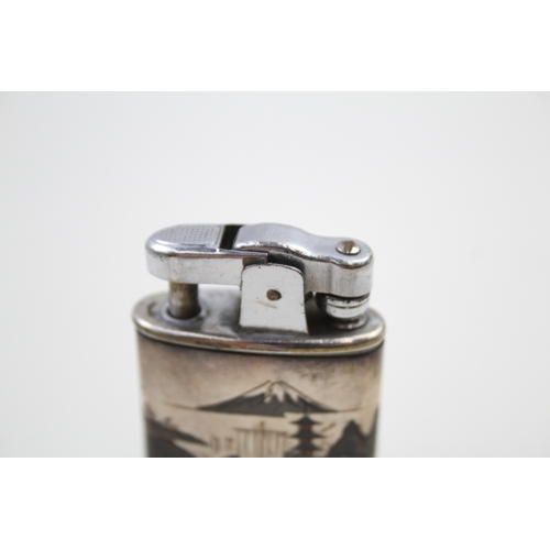 37 - .950 silver cased cigarette lighter