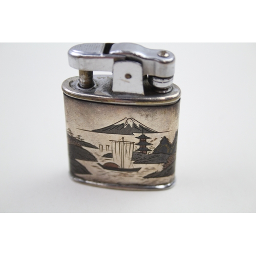 37 - .950 silver cased cigarette lighter