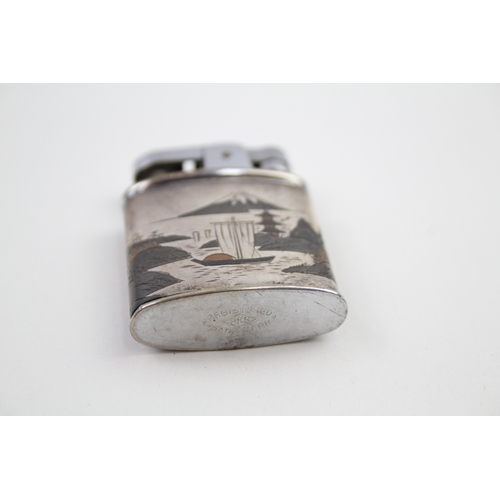 37 - .950 silver cased cigarette lighter