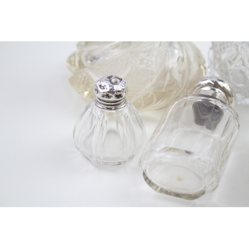 49 - 7 x .925 sterling banded / topped & cut glass ladies vanity scent bottles