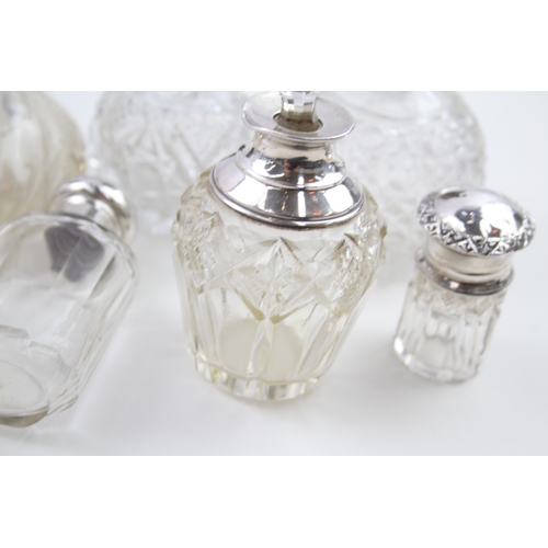 49 - 7 x .925 sterling banded / topped & cut glass ladies vanity scent bottles