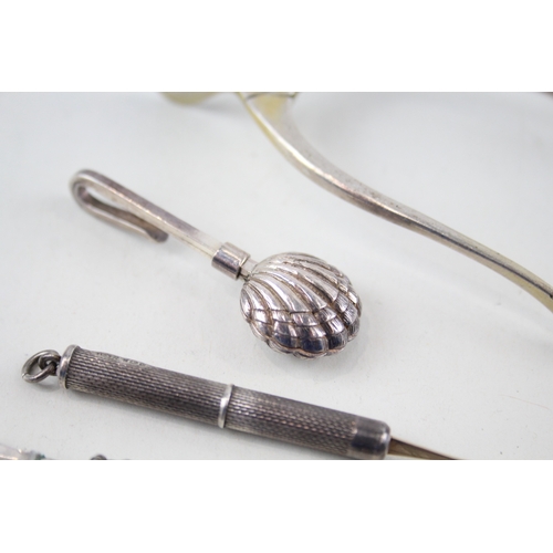 74 - 4 x .925 sterling toothpicks, sgar nips & napkin clip