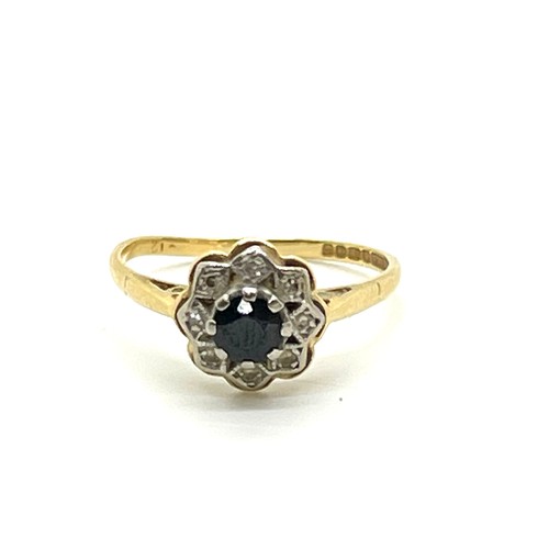 609 - 18ct Gold Diamond and Sapphire dress ring, total weight 2.6 grams