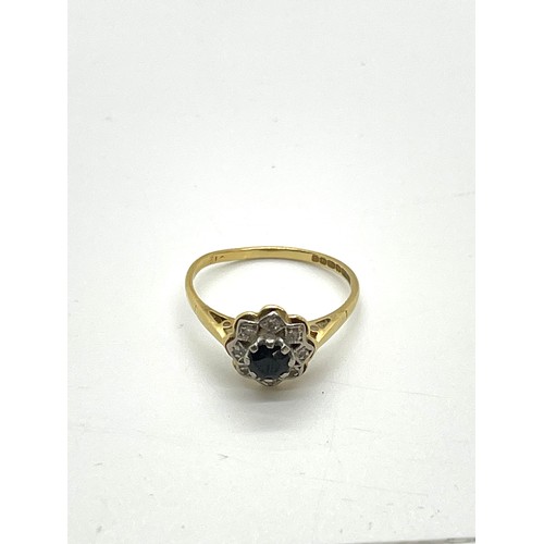 609 - 18ct Gold Diamond and Sapphire dress ring, total weight 2.6 grams