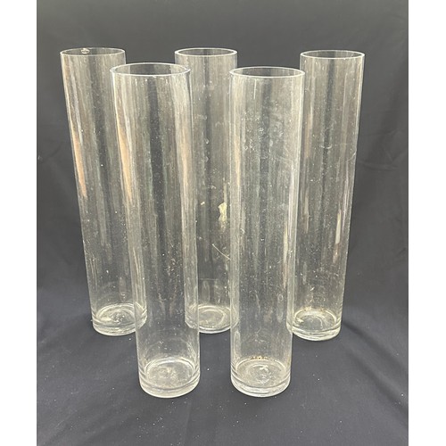 18 - Five tall glass vases overall height 20 inches tall