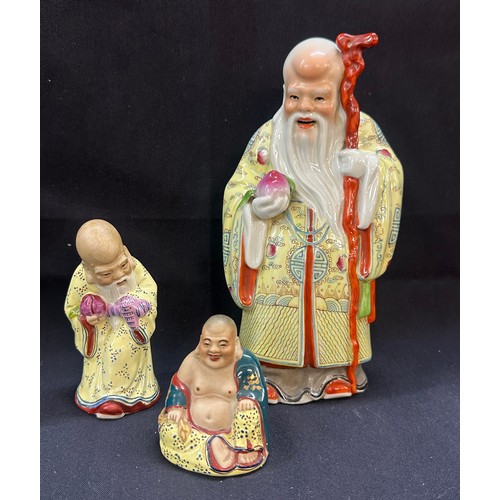 76 - Three oriental figures marks to base tallest measures approx 8 inches tall