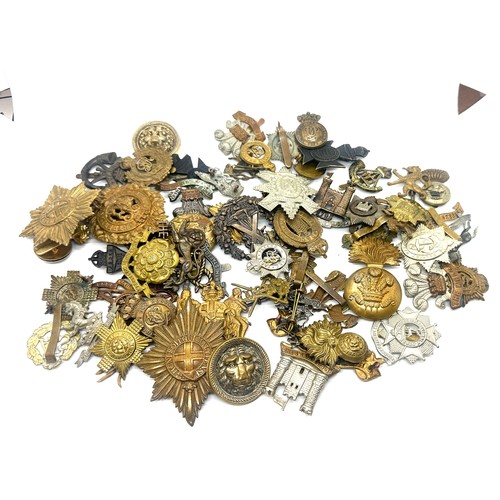 595 - Selection of Cap badges