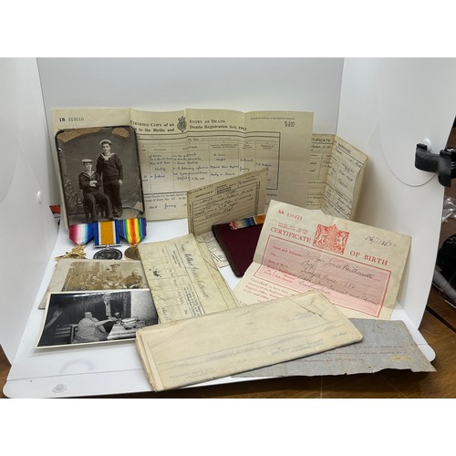 587 - Selection of documents and ww1 medals