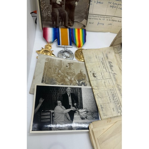 587 - Selection of documents and ww1 medals