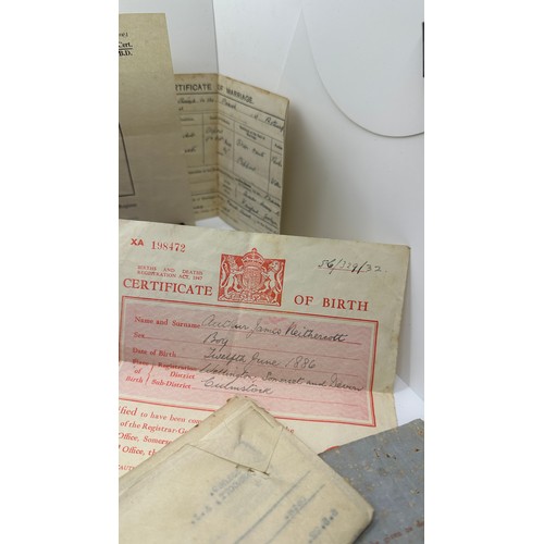 587 - Selection of documents and ww1 medals