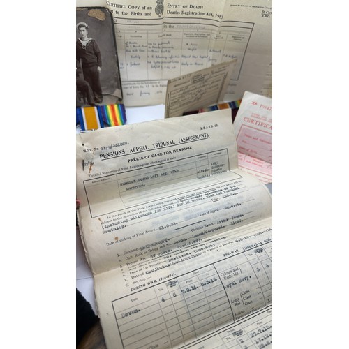 587 - Selection of documents and ww1 medals