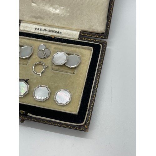 615 - Cased 9ct gold shirt set, missing one button includes cufflinks etc