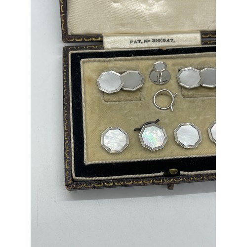 615 - Cased 9ct gold shirt set, missing one button includes cufflinks etc