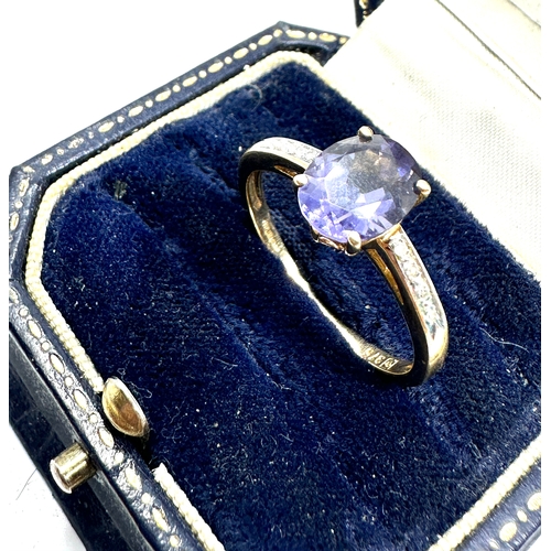 156 - 9ct gold diamond & tanzanite  ring weight 2.6g