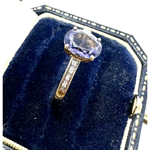 156 - 9ct gold diamond & tanzanite  ring weight 2.6g