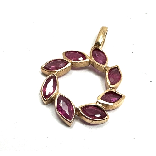 159 - 9ct gold ruby pendant