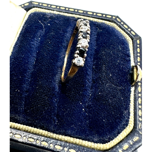 166 - 9ct gold sapphire & white gemstone ring