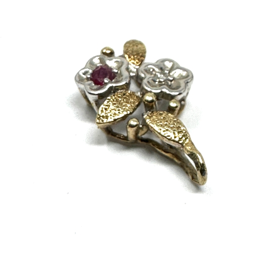 171 - 9ct gold diamond & ruby pendant