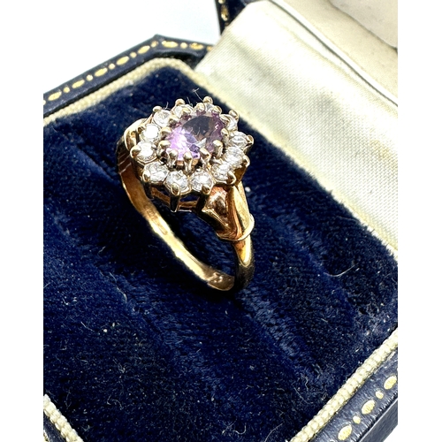 174 - 9ct gold amethyst & white gemstone ring weight 2.4g