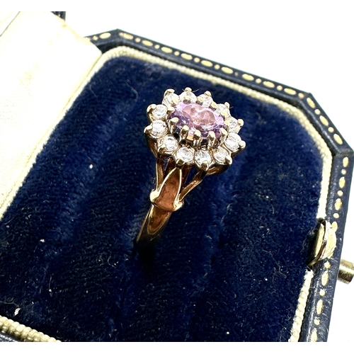 174 - 9ct gold amethyst & white gemstone ring weight 2.4g