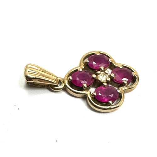 181 - 9ct gold ruby & diamond pendant