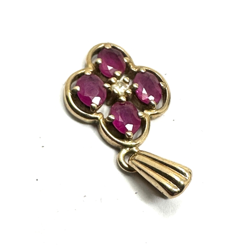 181 - 9ct gold ruby & diamond pendant