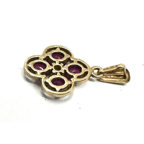 181 - 9ct gold ruby & diamond pendant