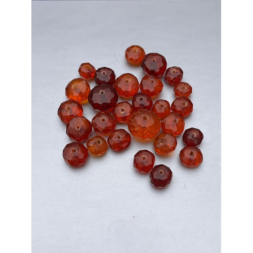 190 - Antique faceted amber beads for necklace repair approx 34g largest bead measures approx 1.8cm