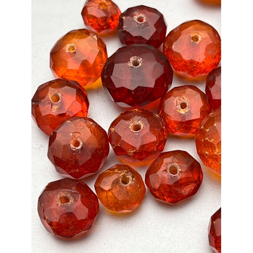 190 - Antique faceted amber beads for necklace repair approx 34g largest bead measures approx 1.8cm