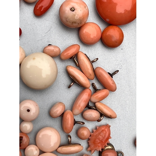 193 - Assorted antique coral beads buttons etc weight 75g also includes bone umbrella needle case