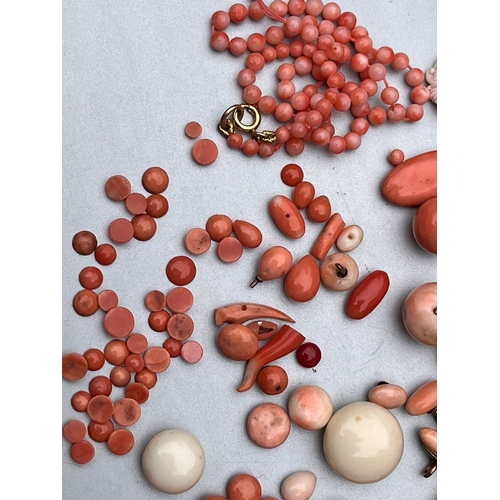 193 - Assorted antique coral beads buttons etc weight 75g also includes bone umbrella needle case