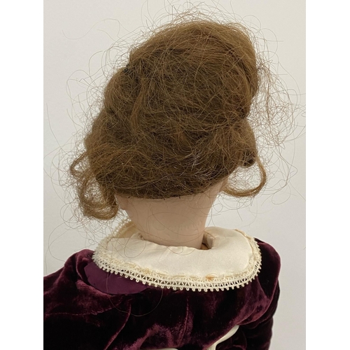 458 - Antique bisque head doll composition body makers mark to back of head height 43cm