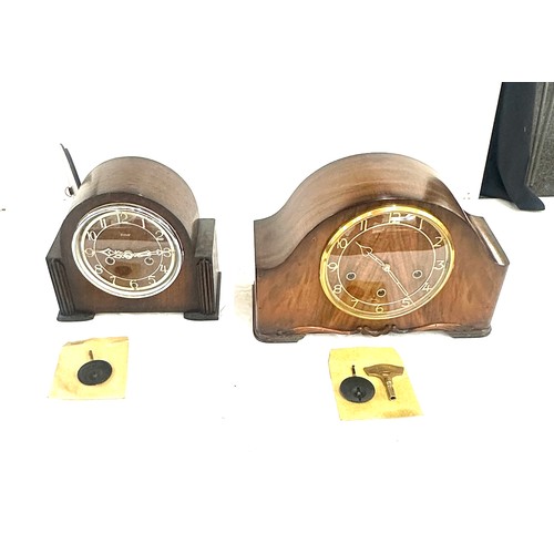 91 - Two wooden mantel clocks, one three key hole with key and pendulum, one two key with pendulum- both ... 