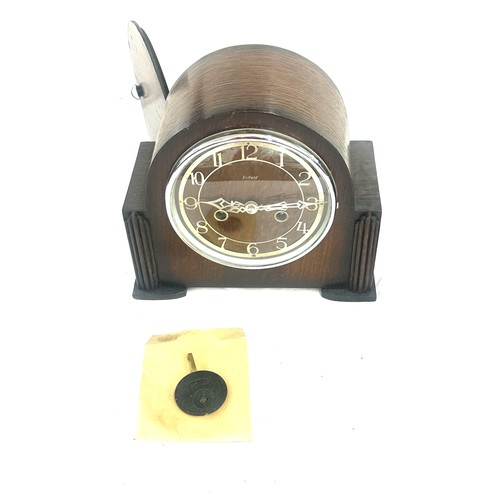 91 - Two wooden mantel clocks, one three key hole with key and pendulum, one two key with pendulum- both ... 