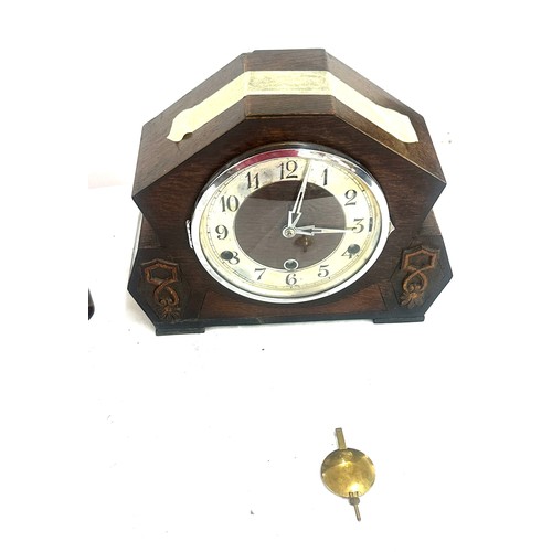 37 - Two three key hole wooden mantel clocks one with key and pendulum the other pendulum only - both AF ... 