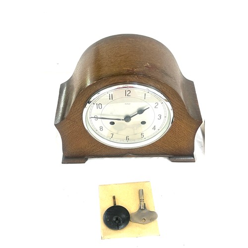 63 - Two wooden mantel clocks one two key hole with key and pendulum, the other one key hole with pendulu... 