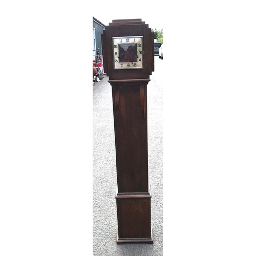 268 - Oak grandmother clock with a quartz movement overall 68 inches tall
