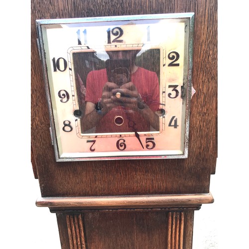 268 - Oak grandmother clock with a quartz movement overall 68 inches tall