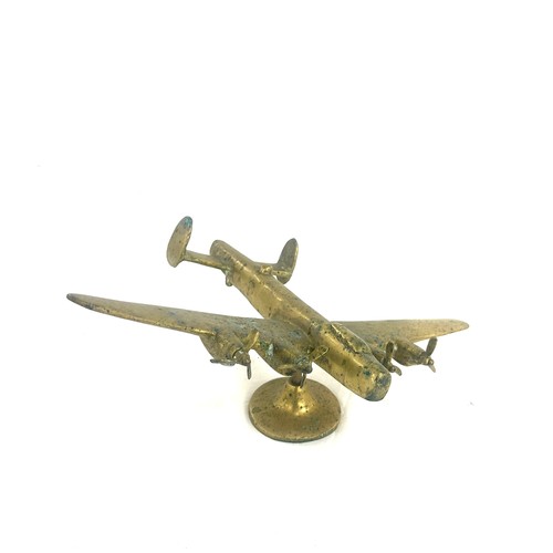 15 - Brass aeroplane mascot measures approx 5 inches tall by 14 inches wide