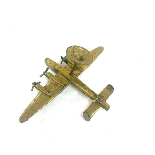 15 - Brass aeroplane mascot measures approx 5 inches tall by 14 inches wide