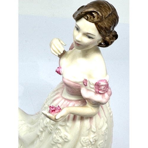 562 - Royal Doulton Figurine Charity HN 4243 Year 2000 Millennium