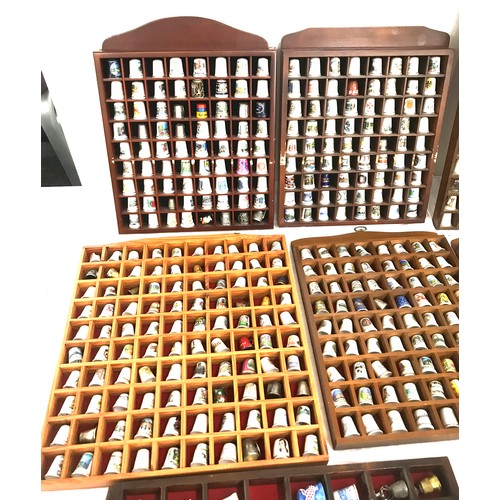 240 - Large selection of assorted Thimbles includes metal thimbles, pottery etc with display cases