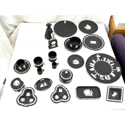 242 - Selection of black and white Wedgwood Jasper ware to include plates, clock, cups etc