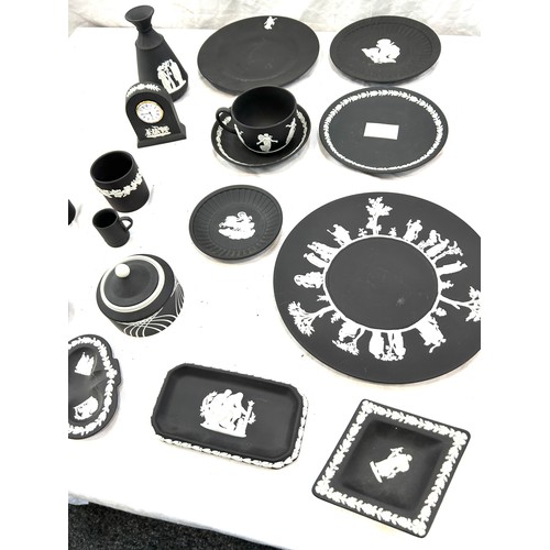 242 - Selection of black and white Wedgwood Jasper ware to include plates, clock, cups etc