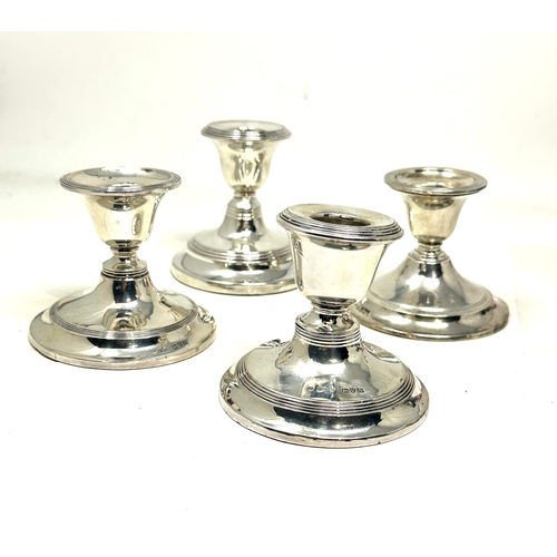 16 - 4 silver squat candle sticks non matching