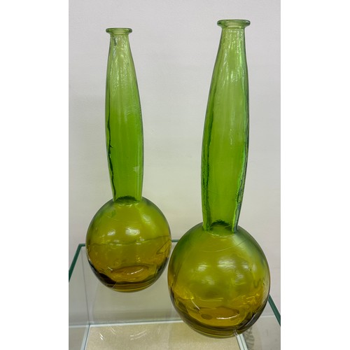 32 - Pair decorative green and yellow glass vase's both in good overall condition, approximate height 49c... 